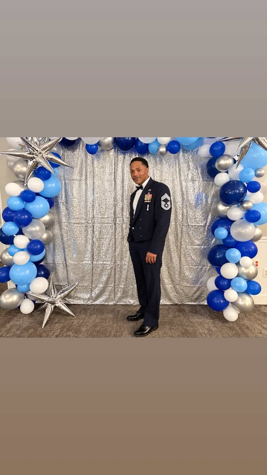 CMSgt Delmont Benjamin in mess dress at a celebration